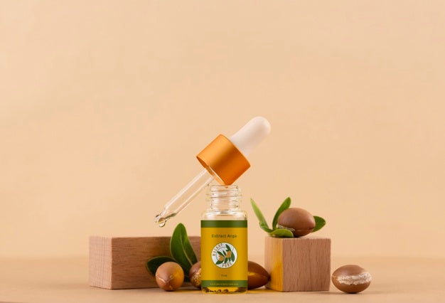 Argan Oil Cosmetic Bottle Mock-Up With Wooden-Shaped Podium And Kernels Psd