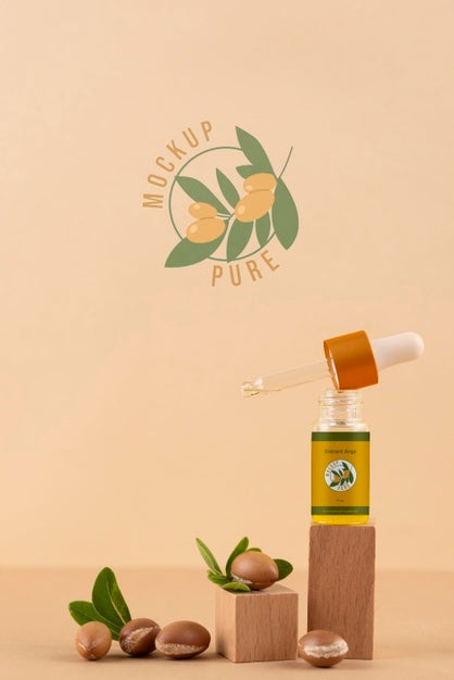 Argan Oil Cosmetic Bottle Mock-Up With Wooden-Shaped Podium And Kernels Psd