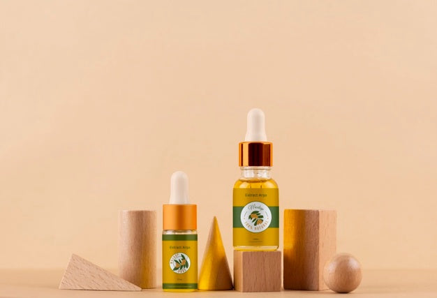 Argan Oil Cosmetic Bottle Mock-Up With Wooden-Shaped Podium And Kernels Psd