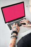Arms With Tattoos Using Laptop Psd