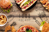 Arrangement Of Fast Food On Wooden Background Psd