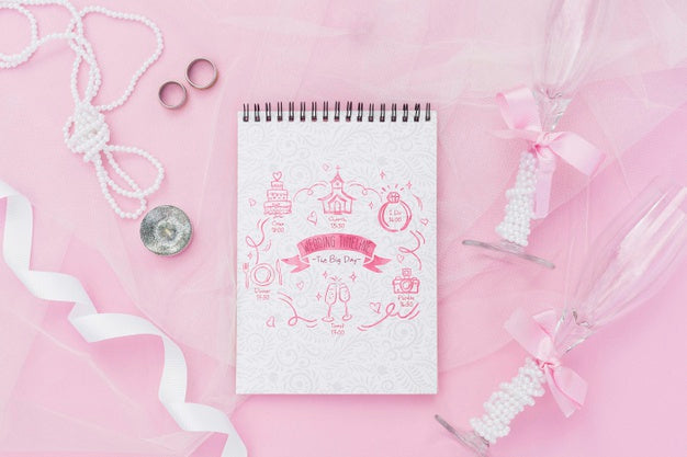 Arrangement Of Notepad With Wedding Ideas And Decorations Psd