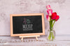Arrangement With Blackboard And Flowers Psd