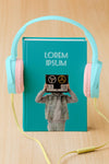 Arrangement With Book Cover Mock-Up And Headphones Psd