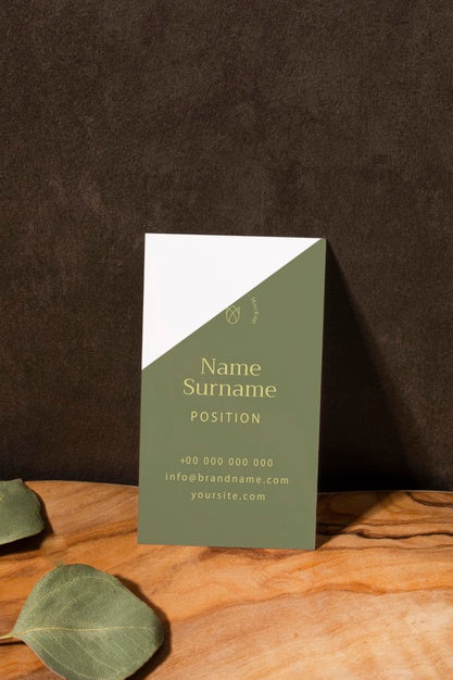 Arrangement With Business Card And Leaves Psd