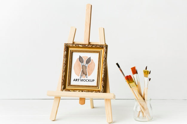 Arrangement With Frame And Canvas Stand Psd