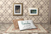 Arrangement With Frames On Wall And Pillow On Carpet Psd