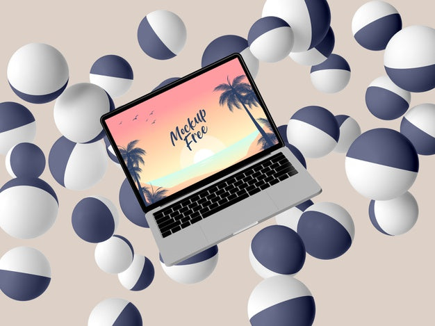 Arrangement With Laptop And Balls Psd