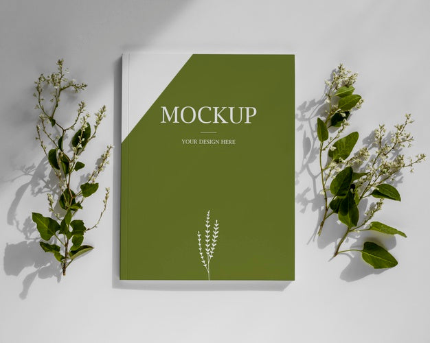 Arrangement With Magazine And Leaves Above View Psd