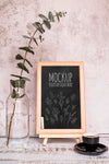 Arrangement With Plant And Blackboard Psd