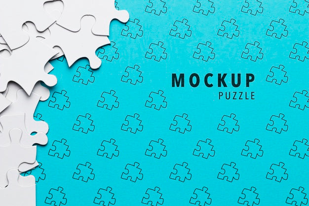 Arrangement With Puzzle Pieces On Blue Background Psd