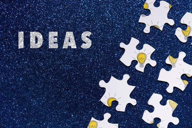 Arrangement With Puzzle Pieces On Glitter Background Psd