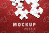 Arrangement With Puzzle Pieces On Red Background Psd