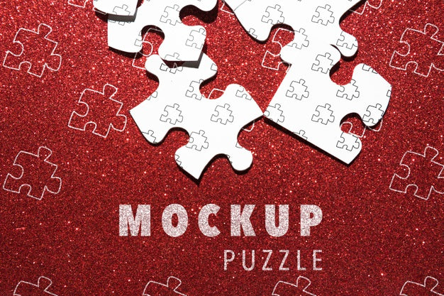 Arrangement With Puzzle Pieces On Red Background Psd