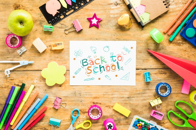 Arrangement With Supplies For School On Wooden Background Psd