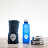 Arrangement With Water Bottle And Towel Psd