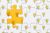 Arrangement With White And Yellow Pieces Of Puzzle Psd