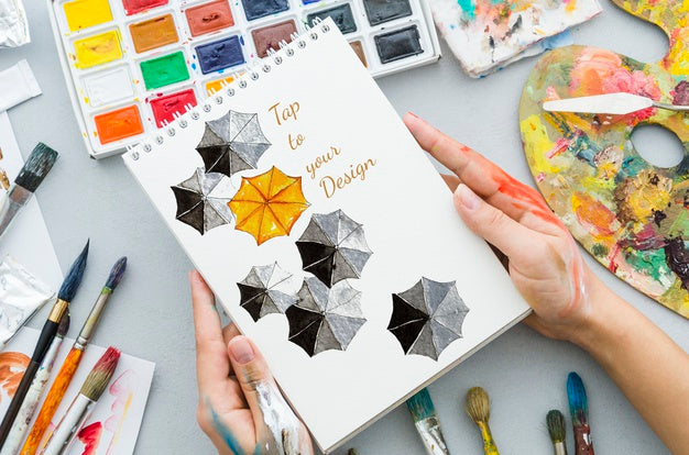 Artistic And Colorful Concept On Notebook Psd