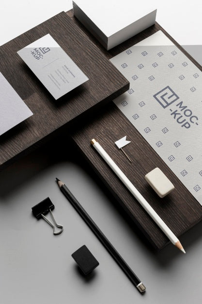 Assortment Of Mock-Up Stationery On Wood Psd