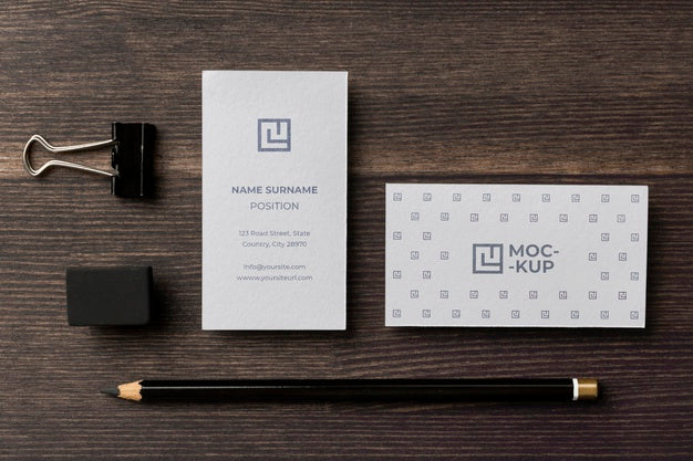 Assortment Of Mock-Up Stationery On Wood Psd