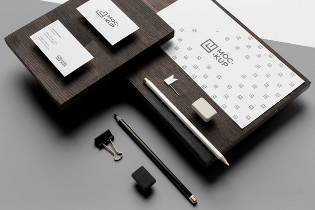 Assortment Of Mock-Up Stationery On Wood Psd