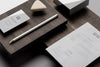 Assortment Of Mock-Up Stationery On Wood Psd