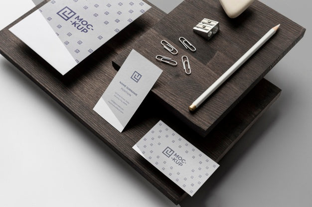 Assortment Of Mock-Up Stationery On Wood Psd