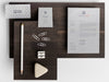 Assortment Of Mock-Up Stationery On Wood Psd