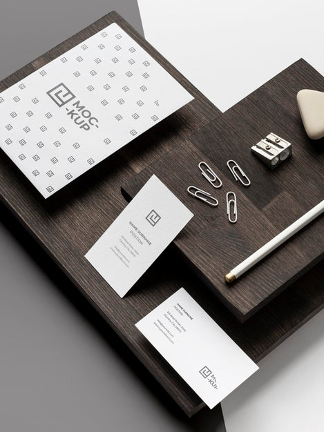 Assortment Of Mock-Up Stationery On Wood Psd