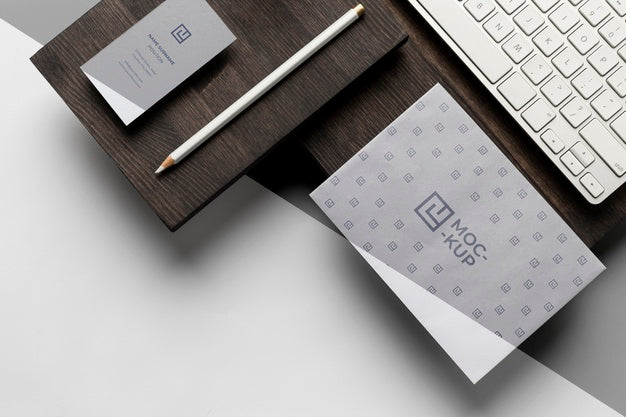 Assortment Of Mock-Up Stationery On Wood Psd