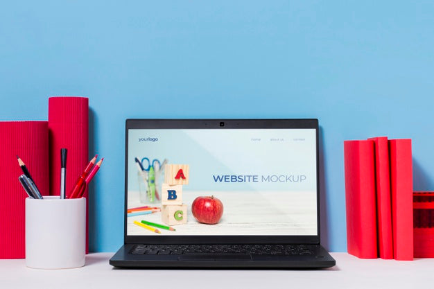 Assortment Of Pens And Laptop With Mock-Up Psd