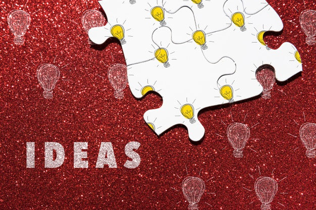 Assortment With Puzzle Pieces On Red Background Psd