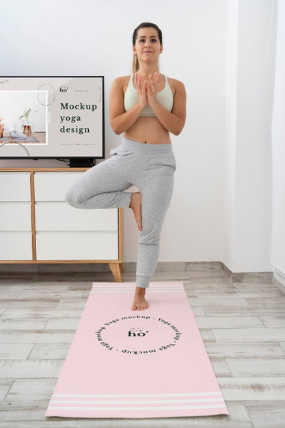 Athletic Woman Doing Yoga At Home Psd