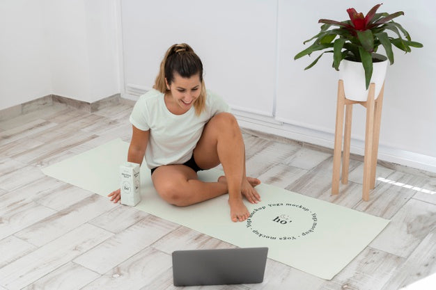 Athletic Woman Doing Yoga At Home Psd