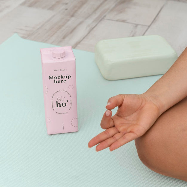 Athletic Woman Doing Yoga At Home With Water Bottle Psd