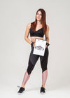 Athletic Woman In Gym Clothes Holding Notepad Psd