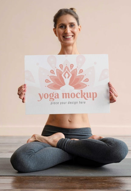 Athletic Young Woman Holding Mock-Up Banner While Doing Yoga Psd