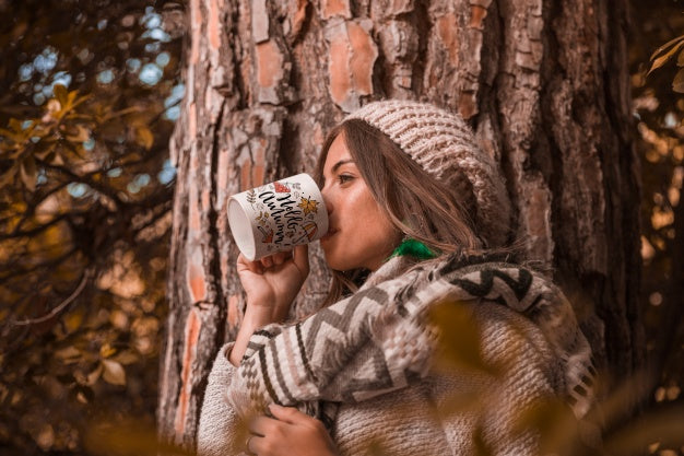 Autumn Concept With Woman Holding Mug Psd