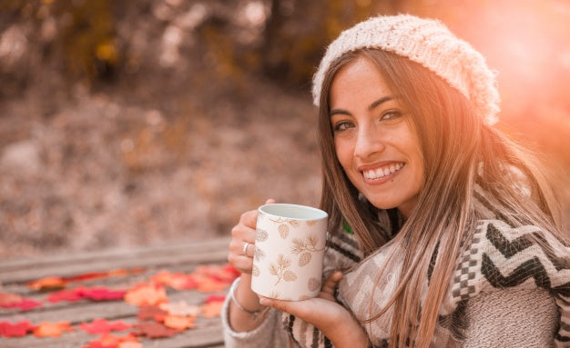 Autumn Concept With Woman Holding Mug Psd