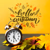 Autumnal Arrangement With Clock And Leaves Psd