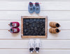 Baby Mockup With Four Pairs Of Shoes Psd