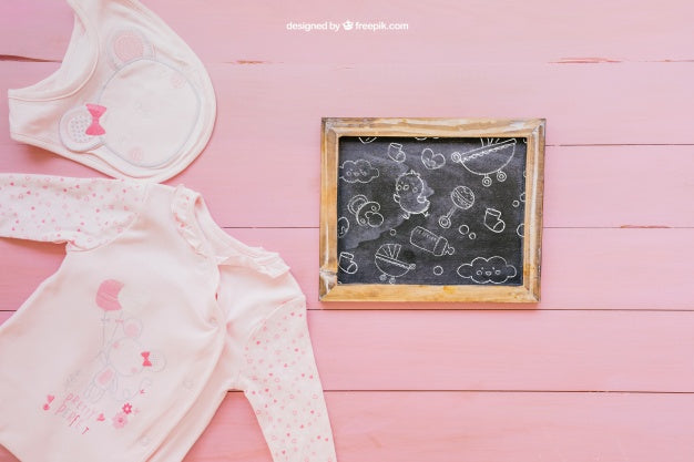 Baby Mockup With Pink Clothes Psd