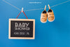 Baby Mockup With Shoes And Slate On Clothes Line Psd