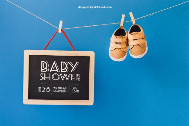Baby Mockup With Shoes And Slate On Clothes Line Psd