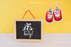 Baby Mockup With Shoes On Clothes Peg Psd