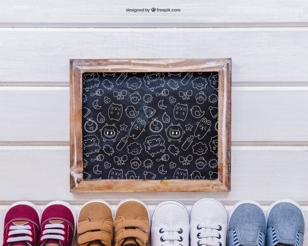 Baby Mockup With Slate And Shoes Below Psd