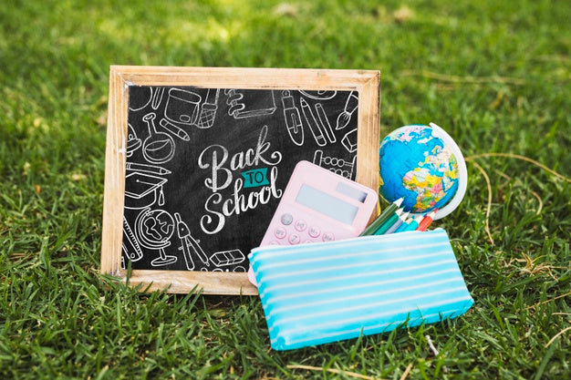Back To School Arrangement On Grass Psd