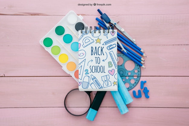 Back To School Composition With Notepad On Wooden Surface Psd
