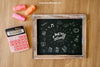 Back To School Composition With Slate And Calculator On Wooden Surface Psd