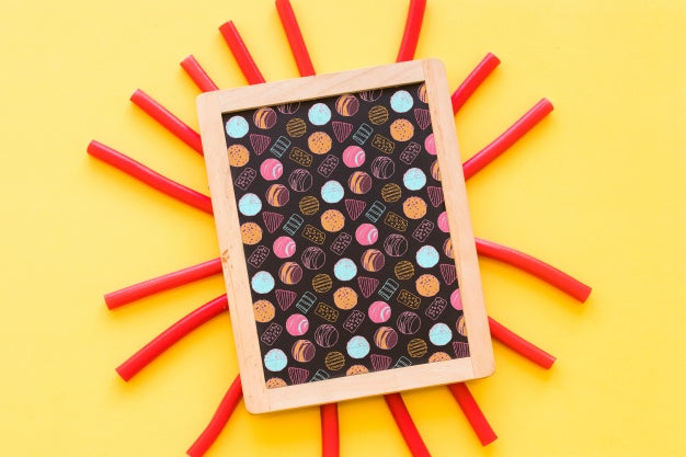 Back To School Composition With Slate And Sweets Psd